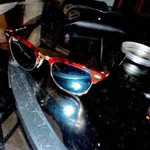 These are a pair of Ray-Ban sunglasses with polarized lenses